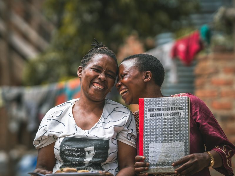 Two women smiling during women's enterprise program